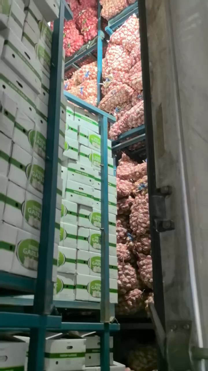 Cold storage racks of packed produce